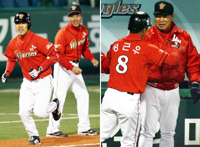 6일 대전 한밭야구장에서 열린 2007 프로야구 SK와 한화의 경기 9회초 SK 정근우가 중월 홈런을 때린 뒤 덕아웃에서 이만수 코치와 기쁨을 나누고 있다. 