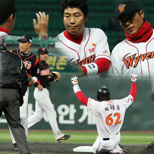 23일 인천 문학구장에서 열린 프로야구 SK 와이번스-롯데 자이언츠의 경기. SK 박재홍이 2회말 도루에 성공하면서 프로야구 통산 첫 250홈런-250도루를 달성한 뒤 동료의 축하를 받고 있다. 