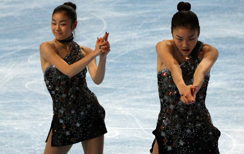 피겨퀸 김연아가 본드걸의 모습을 선보였다. 2009-2010 국제빙상경기연맹(ISU) 피겨 시니어 그랑프리 1차 대회 우승에 도전하는 김연아가 16일 팔레 옴니스포르 드 파리-베르시 빙상장에서 쇼트프로그램 공식연습 중 총을 쏘는 모습으로 마지막 자세를 연기하고 있다. 김연아는 17일 새벽(한국시간) 10명의 출전 선수 가운데 아사다 마오에 이어 9번째로 쇼트프로그램 연기를 펼친다.
 