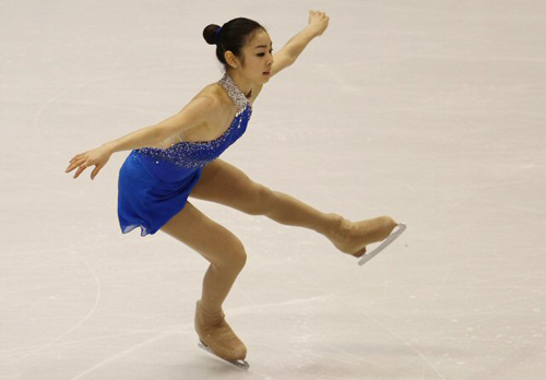 '피겨퀸' 김연아가 16일 오전(한국시간) 뉴욕주 레이크플래시드 '1980 링크'에서 열린 ISU 그랑프리 5차 대회 '스케이트 아메리카' 여자싱글 프리스케이팅 경기에서 점프 후 밝은 표정으로 착지하고 있다. 2009.11.16 utzza@yna
 